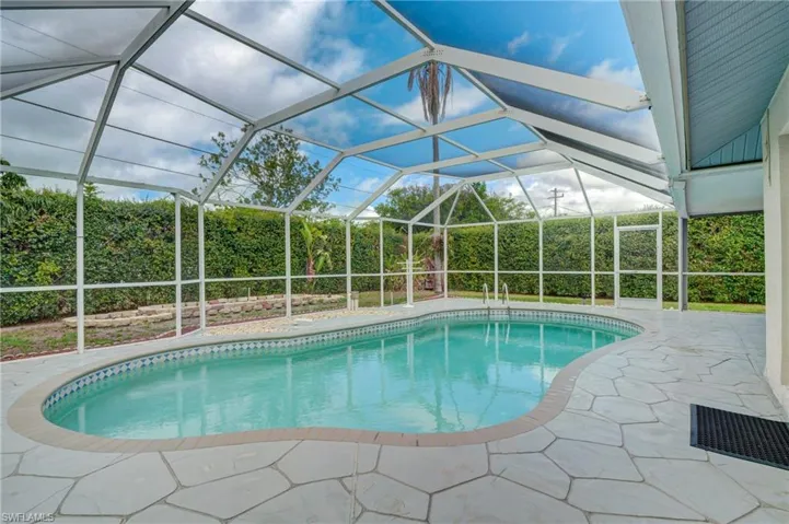 View of swimming pool and lanai.