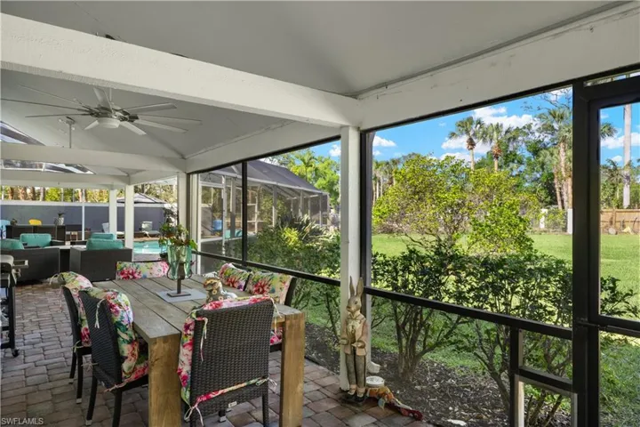 Sunroom featuring a ceiling fan in the lanai area