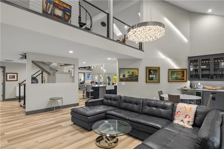 Living area featuring with a custom designed built in bar