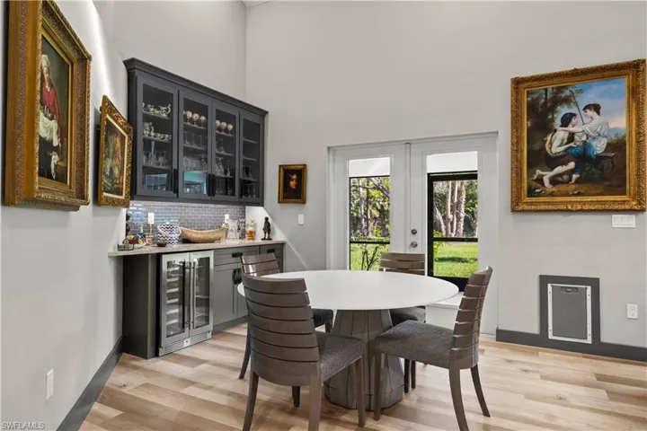Dining area with custom built in bar and wine cooler