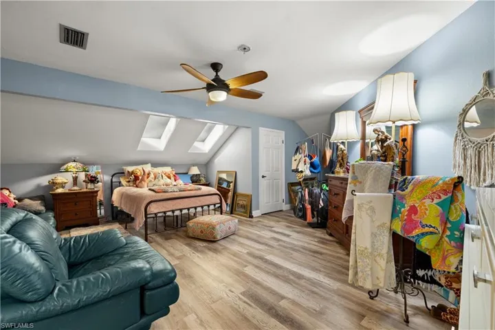 2nd Guest Bedroom with lofted ceiling and skylights