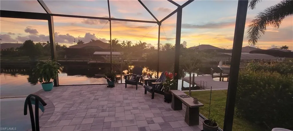 Paver Pool Deck with a water view