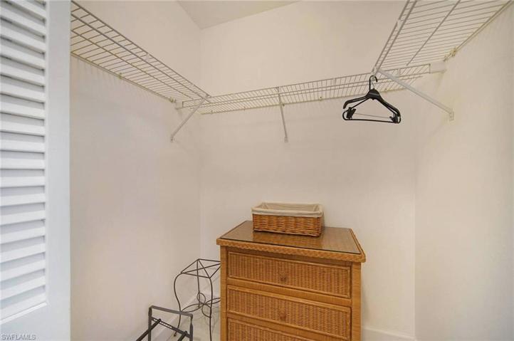 Two walk in closets with chest of drawers