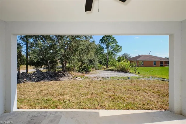 View of yard with ceiling fan