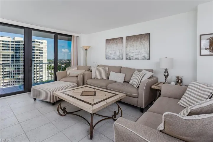 Living room featuring light tile patterned flooring