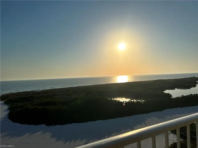 Beautiful coastal view with a sunset on the horizon