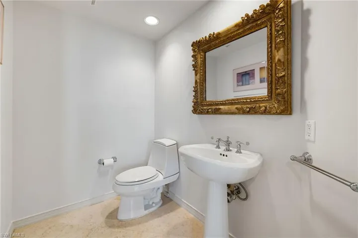 Bathroom featuring recessed lighting and tile patterned flooring