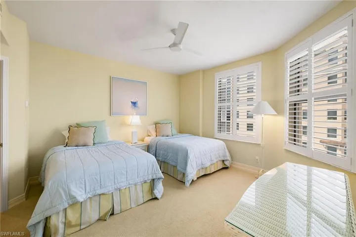 Bedroom featuring carpet flooring and ceiling fan