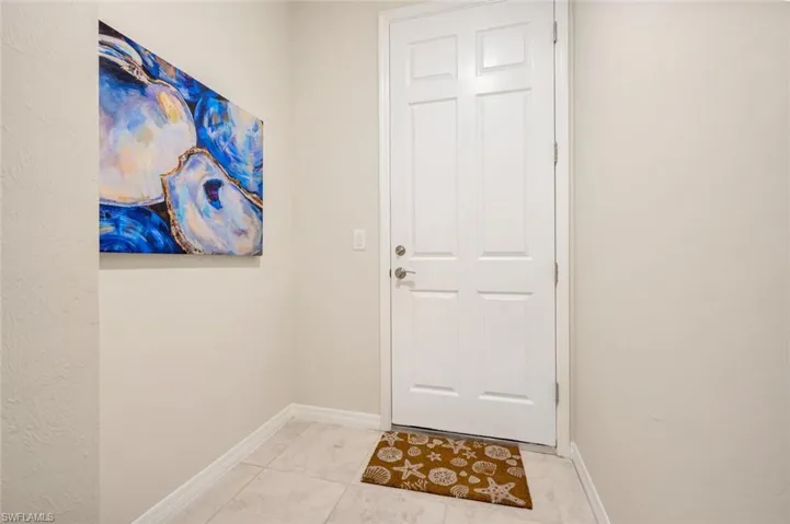 Door leading to 2.5 garage spaces