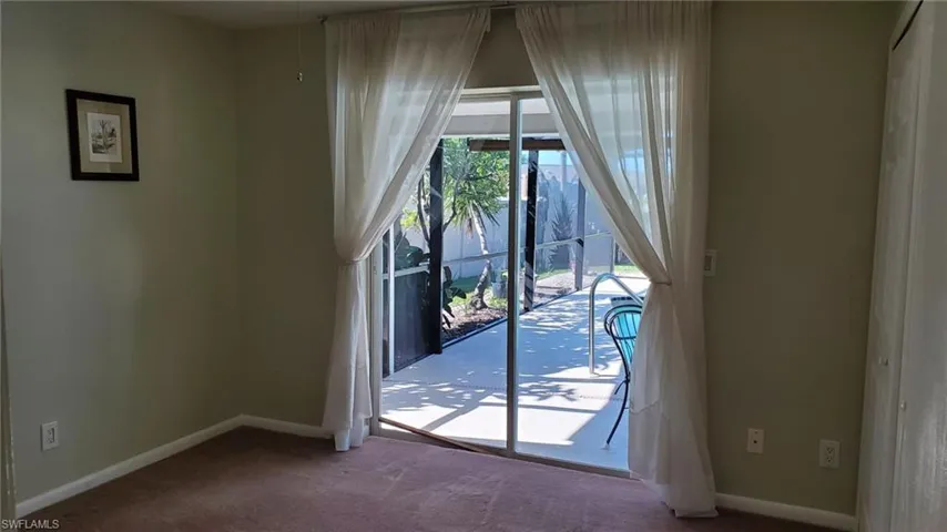 Guest Bedroom/pocket sliding door to pool