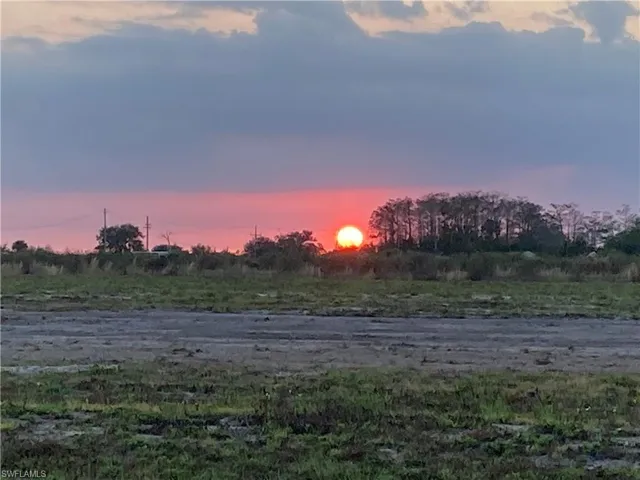 46310 Neal Rd with a beautiful sunset