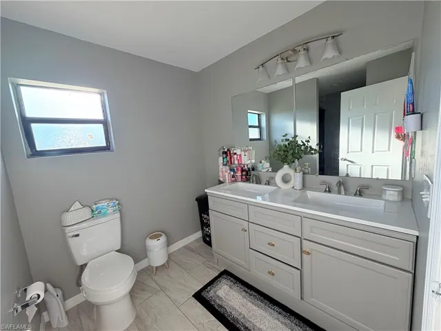100 NW 13th  PL, Cape Coral, FL 33993