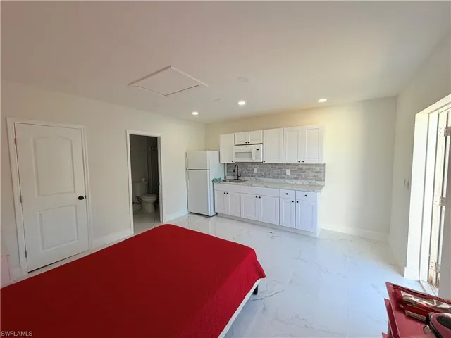 100 NW 13th  PL, Cape Coral, FL 33993