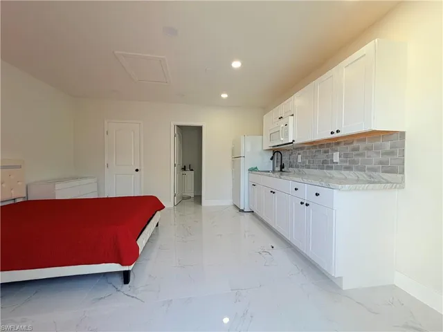 100 NW 13th  PL, Cape Coral, FL 33993