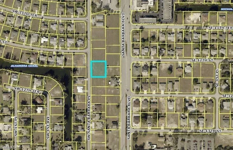 Aerial overview of property's location with property parcel outlined