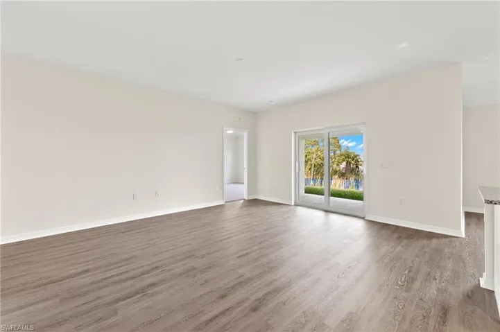 Empty room featuring light wood-style floors and baseboards