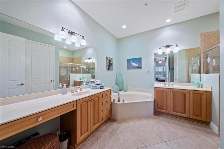Master bath with tub and shower