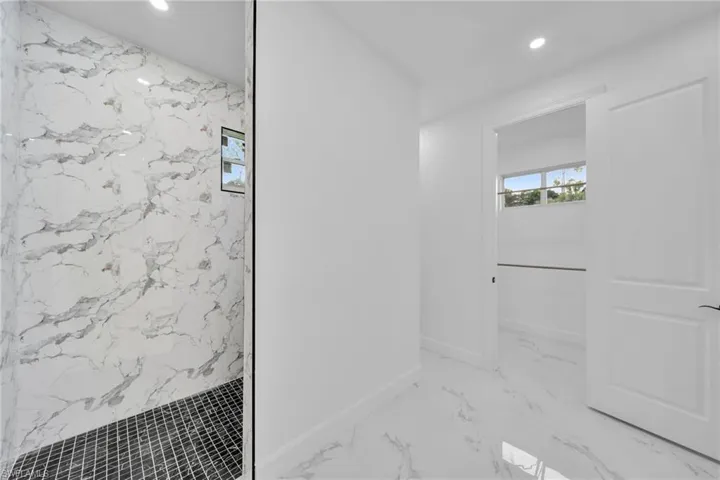 Bathroom with tiled shower
