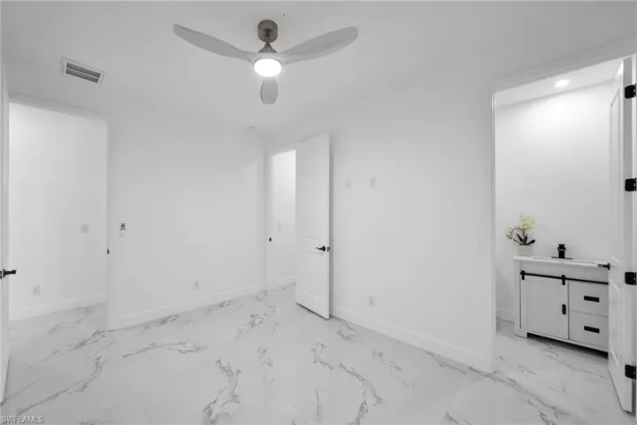 Bedroom featuring ceiling fan