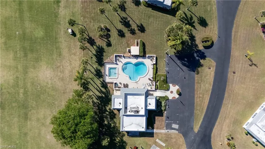 Drone / aerial view of a pool area