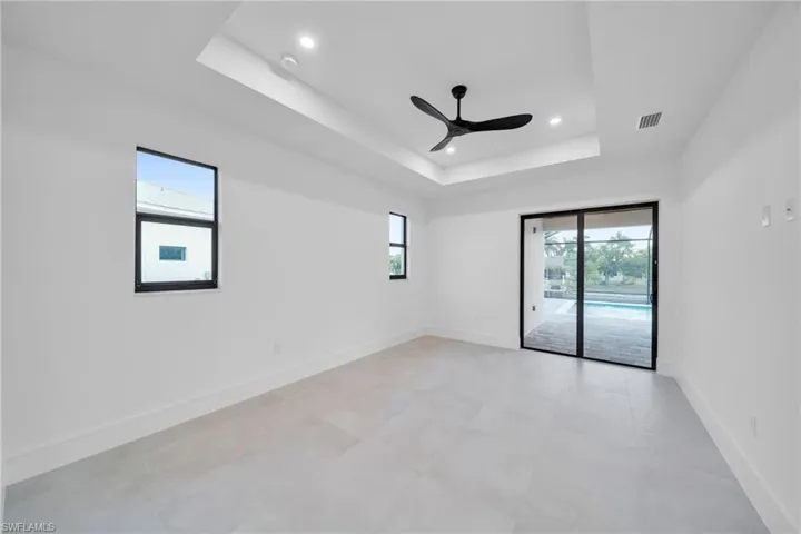 Spare room with a ceiling fan and recessed lighting