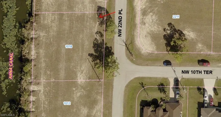 Aerial map of property and surrounding area with property parcel outlined
