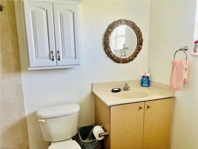 Bathroom featuring vanity and toilet