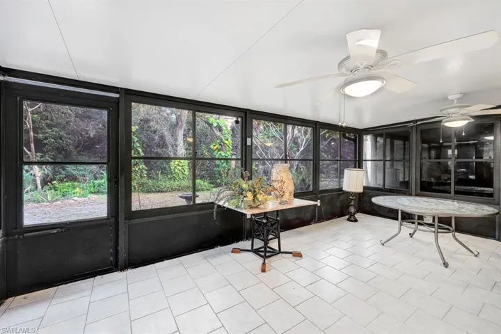 large patio in the back of the townhouse with door to the beautiful outdoor area
