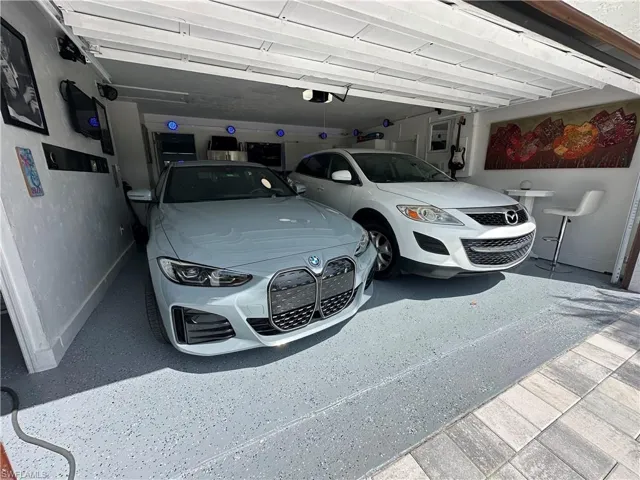 Garage featuring baseboards