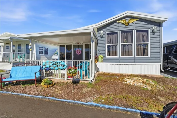 Manufactured / mobile home featuring covered porch