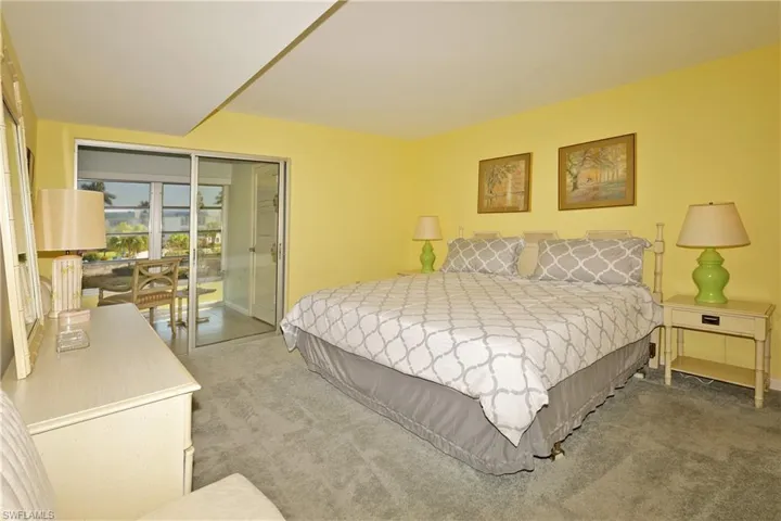 Spacious Master Bedroom with view out to lanai.