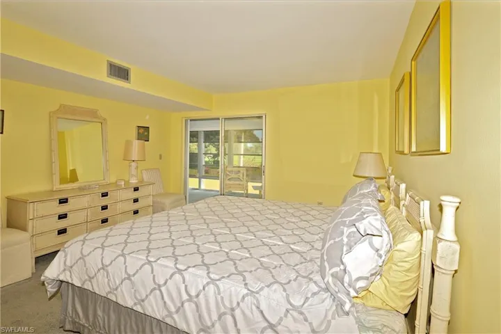 Spacious Master Bedroom with Sliding Glass Doors to the Lanai.