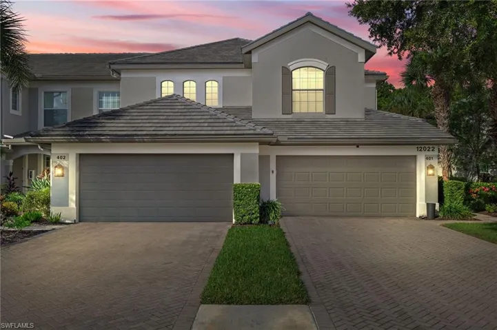 View of front of property featuring a garage