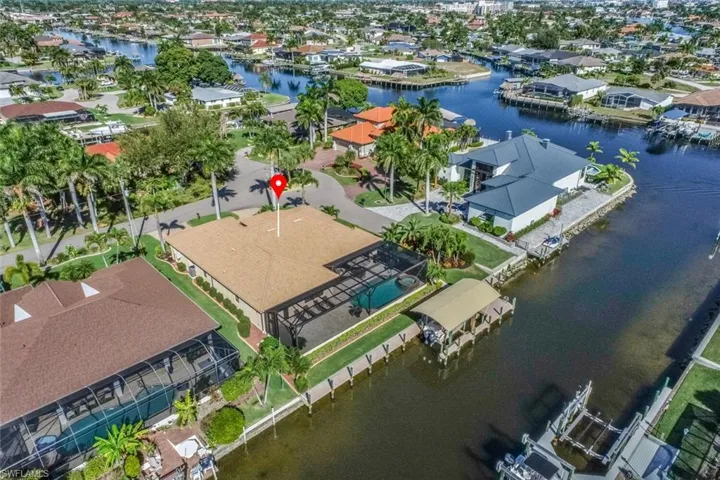 Aerial view of residential area with a nearby body of water