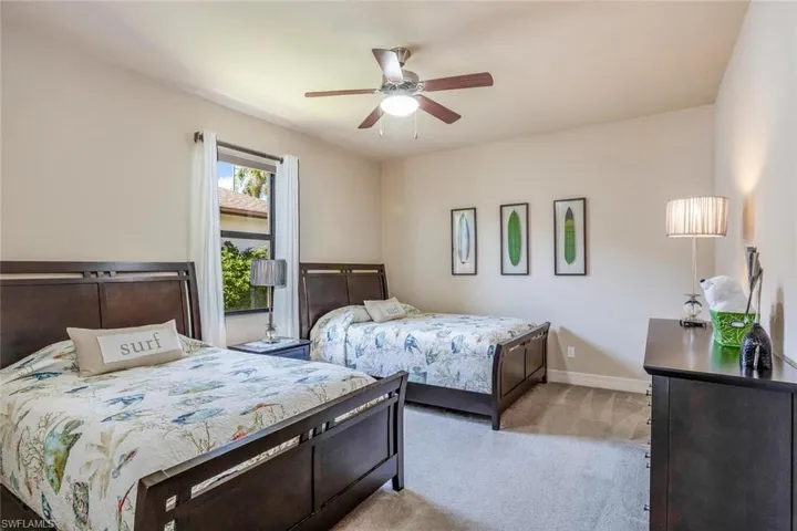 Bedroom with carpet floors and ceiling fan