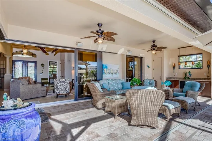 View of patio / terrace featuring an outdoor hangout area and a ceiling fan