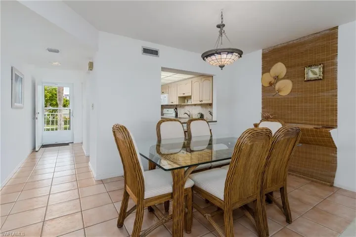 Dining area with tile flooring