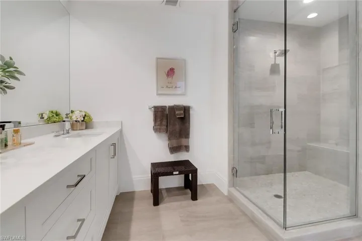 Large primary bathroom with lovely neutral finishes