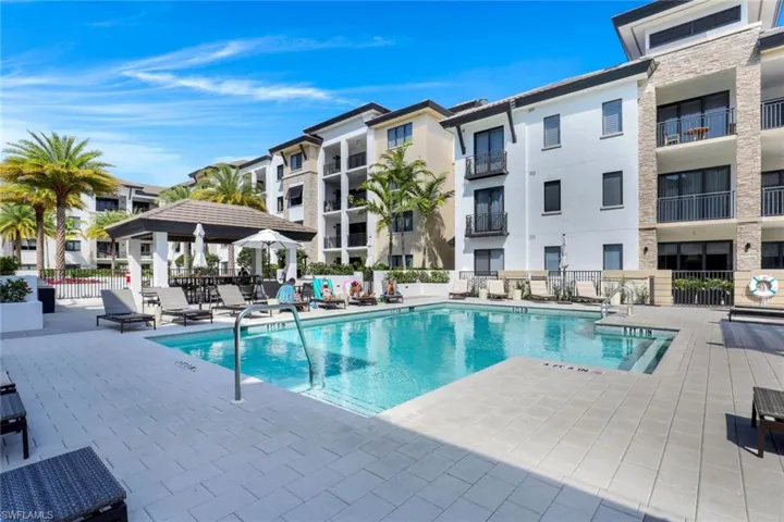 Large pool and spa area with adjoining gazebo and grilling pavilion