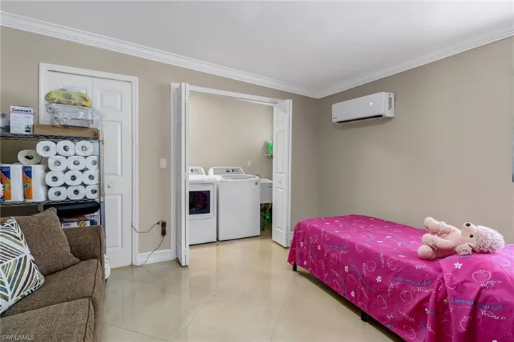 view of washing machine and dryer off the family room.