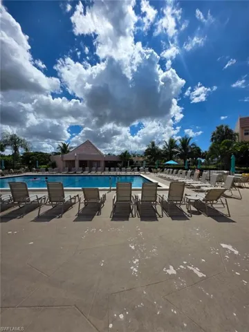 Community pool featuring a patio area