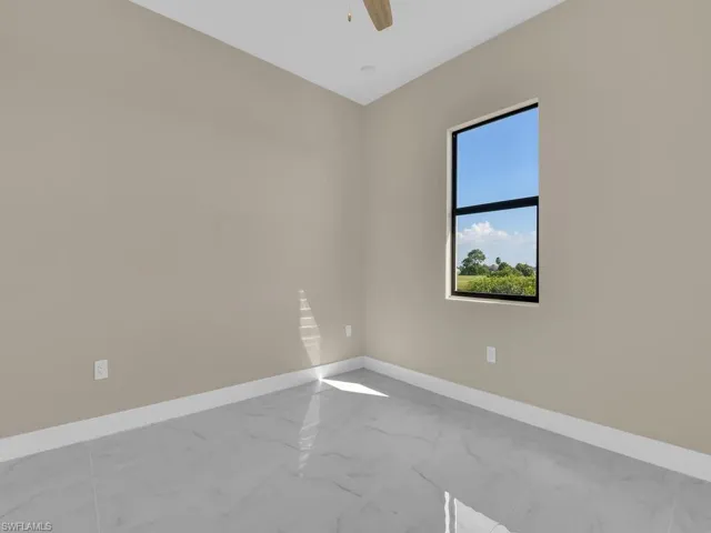 Unfurnished room with ceiling fan