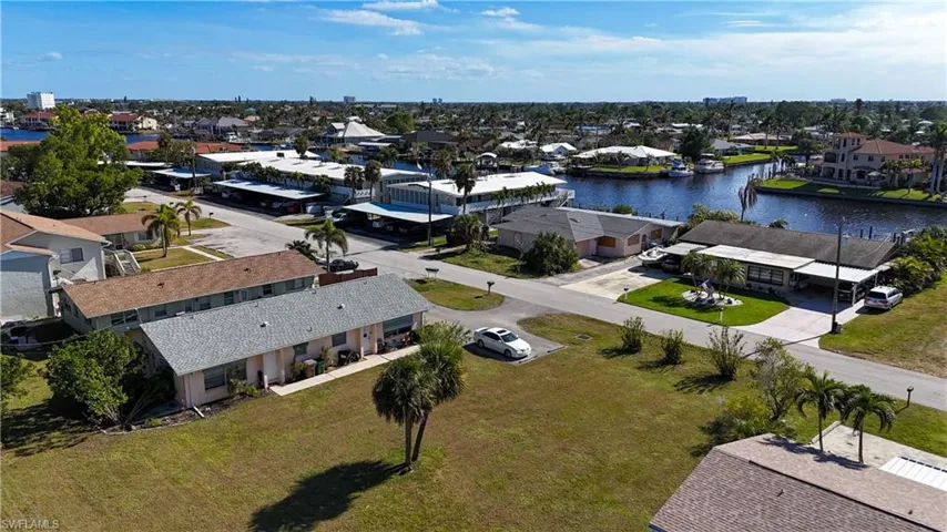 Aerial perspective showcasing waterfront properties and an expansive canal system