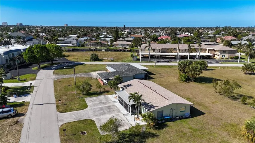 Single-story residence with a screened lanai and an attached carport