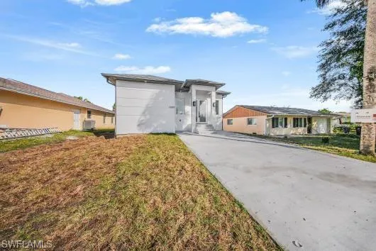 View of front of house featuring stucco siding