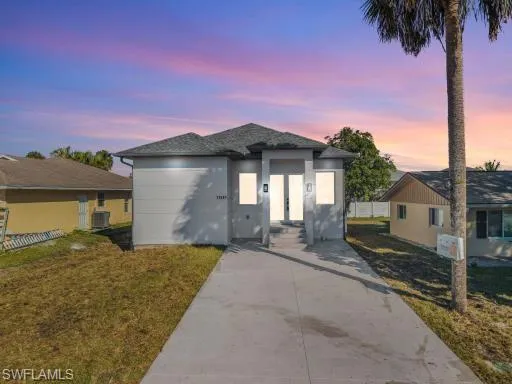View of front of property featuring stucco siding
