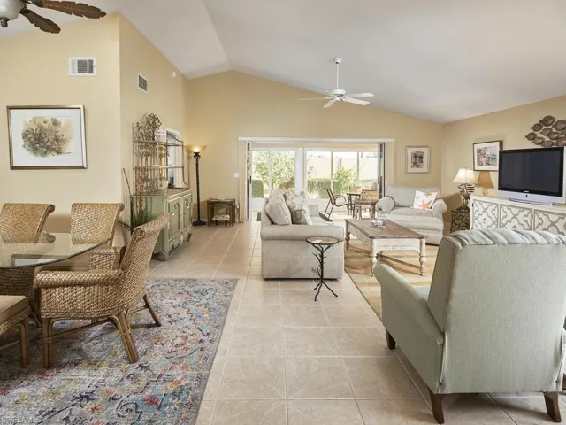 Open-concept design with stylish furnishings and ample natural light.