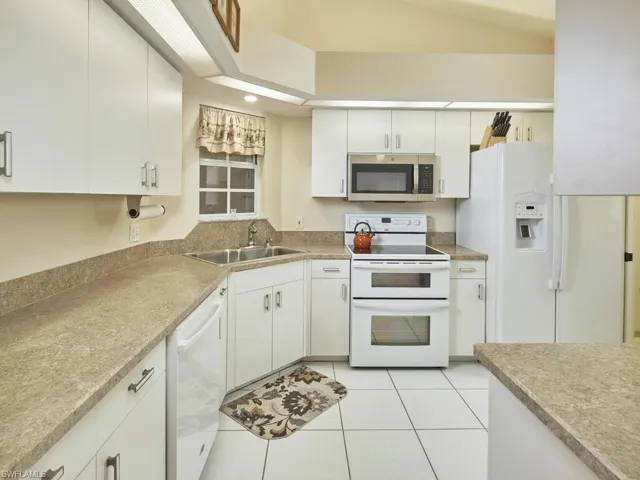 Modern kitchen with plenty of counter space and ample storage.