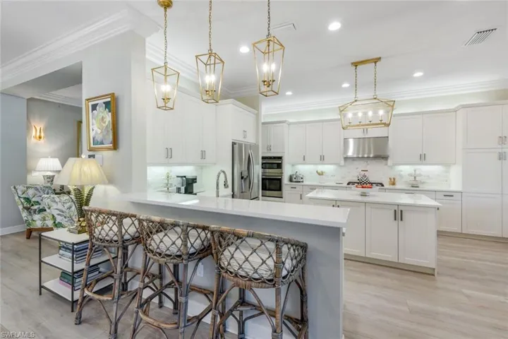 Large kitchen with new appliances and lighting, gas cooktop offers space for family "chefery"