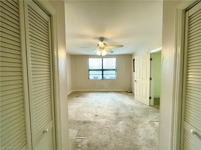 two closets at entry to primary bathroom